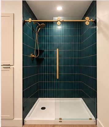 Teal tile walk-in shower