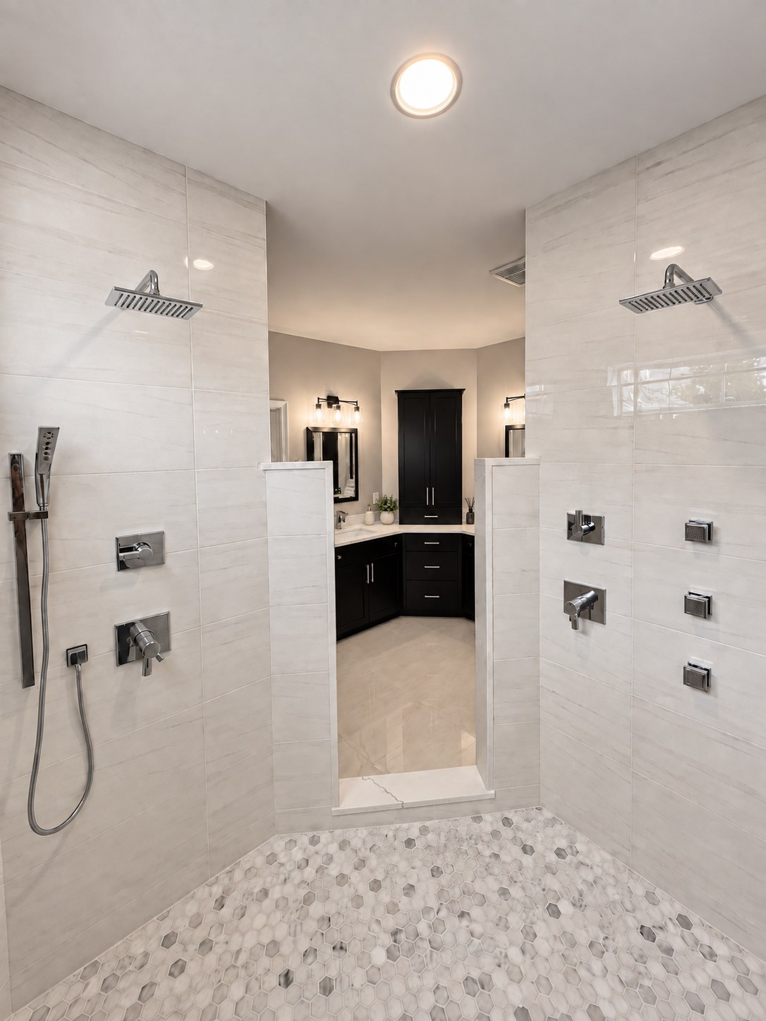 Walk-through steam shower with dual rain heads and hexagon marble floor